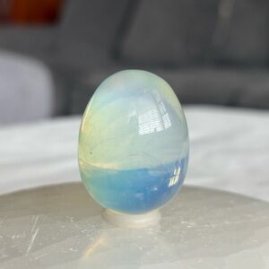 Opalite crystal egg carving